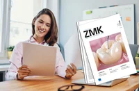 Frau liest ZMK-Magazin